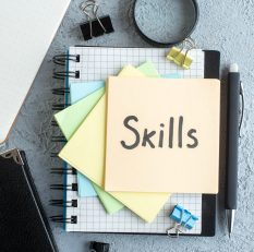 top-view-skills-written-note-with-notepad-light-background-job-office-school-copybook-college-business-colors top-view-skills-written-note-with-notepad-light-background-job-office-school-copybook-college-business-colors